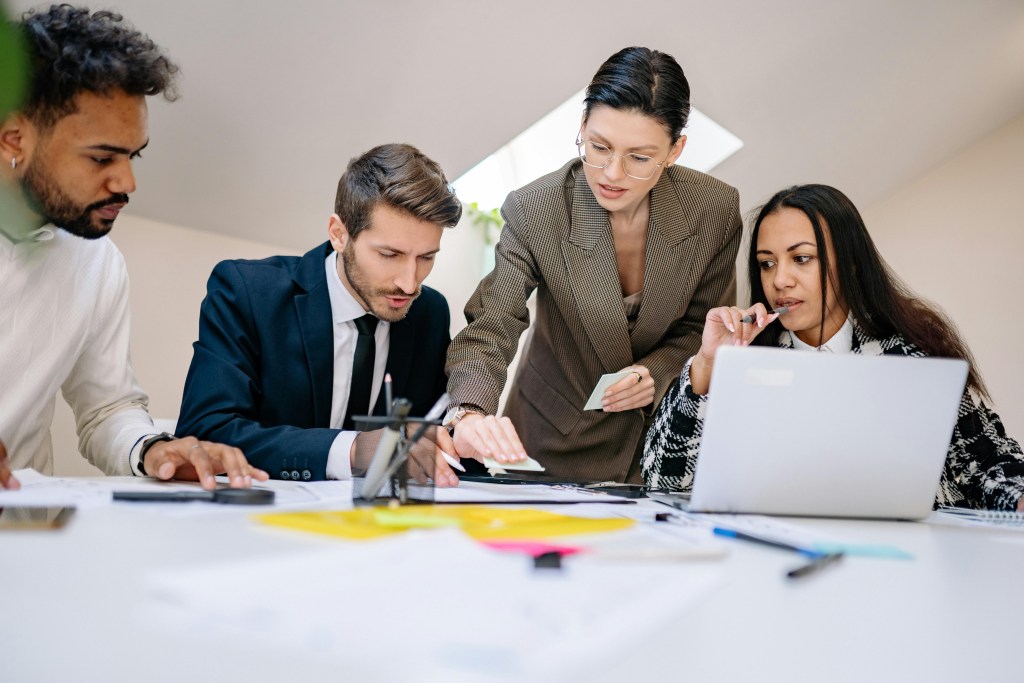 Business team working together - BAM Group